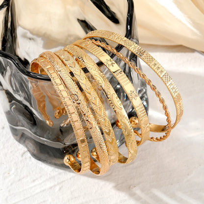 RebelGlow™ 7-Piece Gold Bracelet Collection – Punk & Goth Style